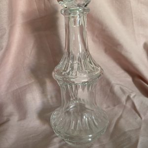 flacon en verre avec bouchon fleur